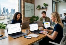 "UK startup team working on laptops and tablets with digital marketing dashboards, SEO charts, social media posts, and email campaigns in a modern office with London city view, 2026."