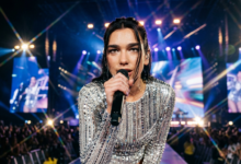 Dua Lipa performing live on Radical Optimism World Tour 2026 - High-resolution real face stage photo