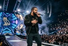 Drake performing live on stage during a concert in 2026.