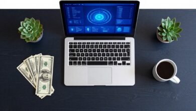 Laptop showing AI dashboard on desk with dollar bills — entry level AI jobs for students