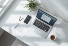 Laptop showing an AI resume builder tool on a clean desk, illustrating the best AI resume builders for job seekers.